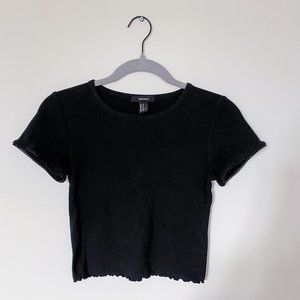 Ribbed Black Baby Tee with Curly Hem and Eyelet Detail
